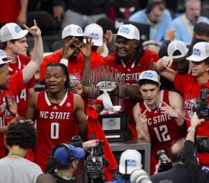 N.C. State emerges victorious against No. 4 North Carolina, clinching the ACC Tournament title and securing an automatic berth in the NCAA tournament.
